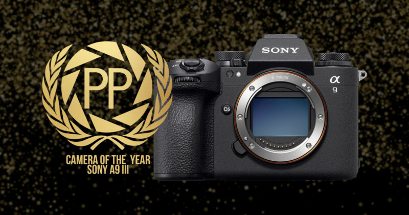 A Sony 85mm f/1.4 GM II lens on a black background with a gold laurel wreath. Text reads “Prime Lens of the Year” in gold letters.