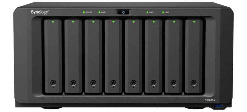 Front view of a Synology network-attached storage (NAS) device with eight drive bays, labeled status LEDs, and a power button on the front panel.
