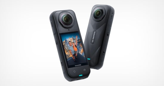 Two black Insta360 X3 action cameras, one showing its touchscreen display with a photo of two people on a city rooftop, the other displaying the Insta360 X3 label on its side.