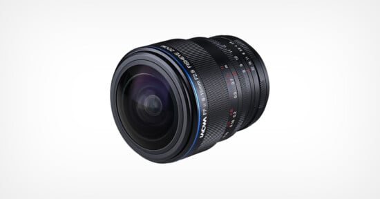 A wide-angle camera lens with black ridged rings, labeled "Laowa 15mm f/2.0 FE Zero-D," featuring a blue accent line and red and white markings for focus and aperture settings, isolated on a white background.
